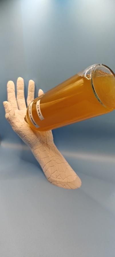 Hand Shaped Wine Bottle Holder: Modern Art Sculpture & Bar Decor - product image 7