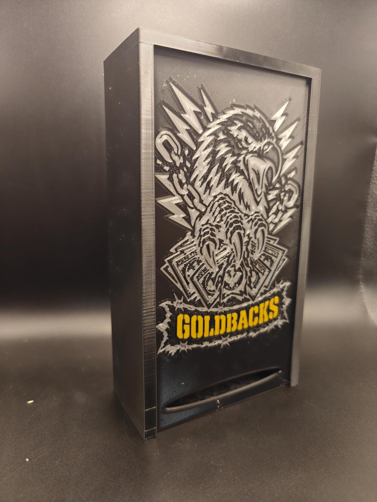 Goldbacks and money box