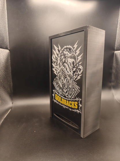 Goldbacks and money box