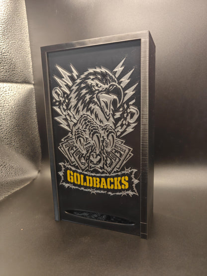 Goldbacks and money box