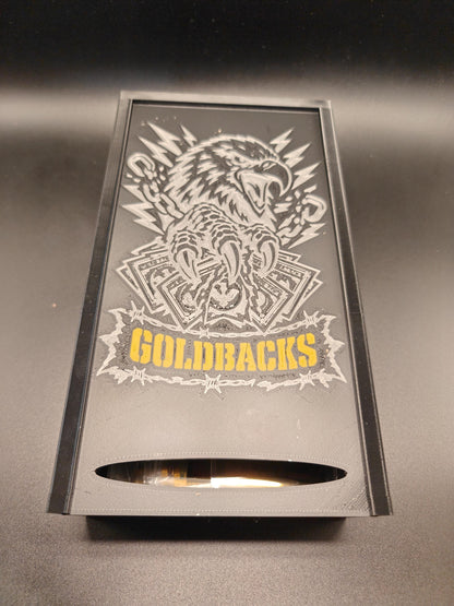 Goldbacks and money box