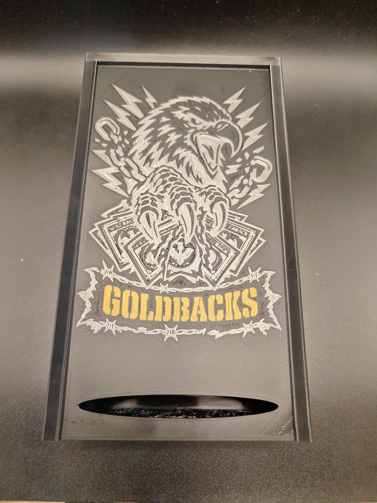 Goldbacks and money box