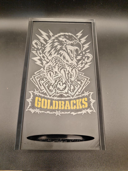 Goldbacks and money box