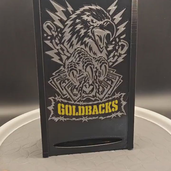 Goldbacks and money box