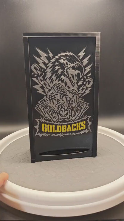 Goldbacks and money box